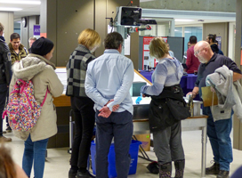 Students and staff investigating the digital sandbox