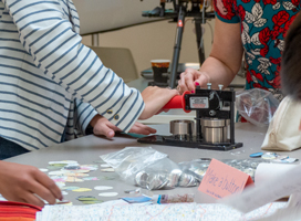 Western Libraries' button maker in action