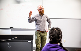 Music staff member teaching in the classroom