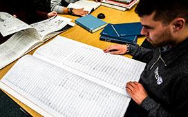 Student looking at sheet music