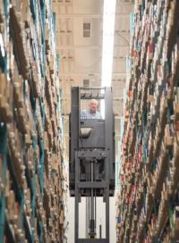 A staff member retrieves materials from the high-density storage at Western Libraries’ Archives and Research Collections Centre
