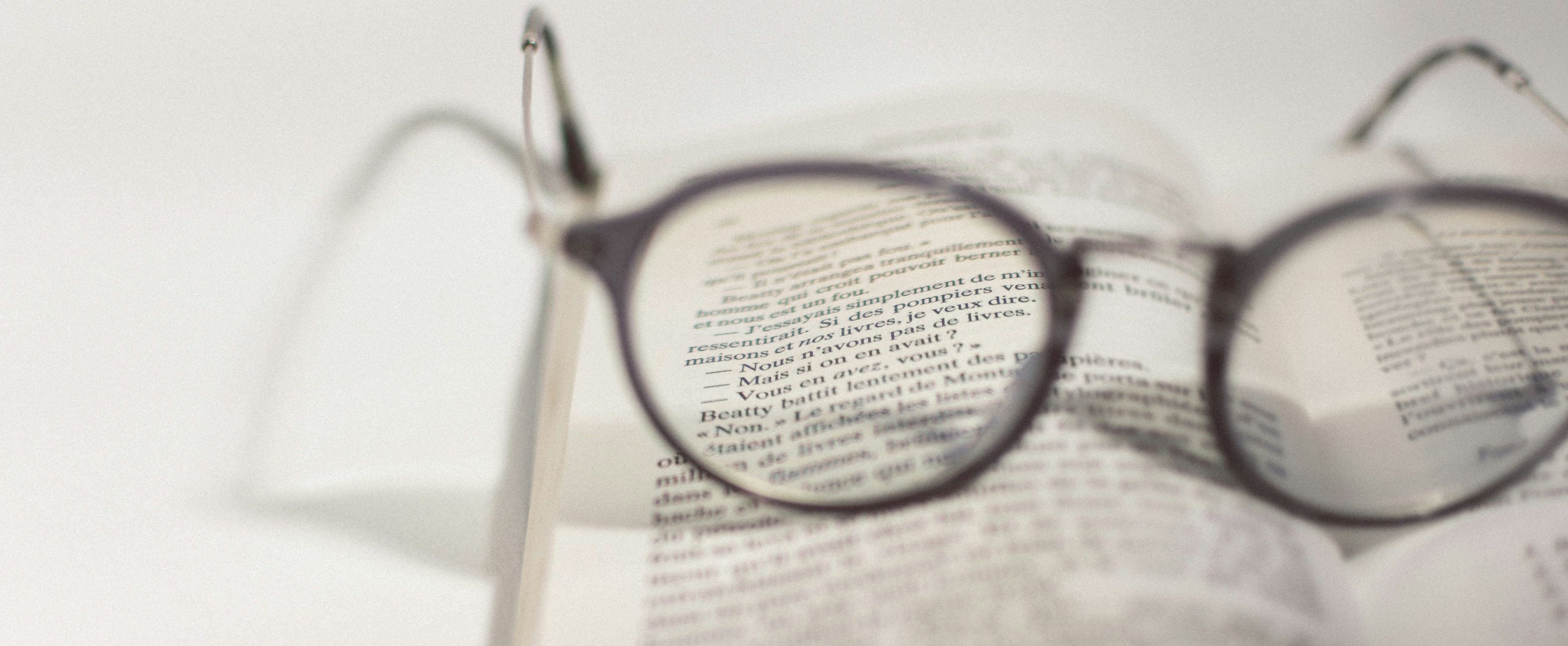 glasses sitting on book