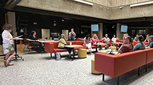 Librarian giving a presentation in the Scholars Lab.